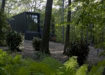 Shipping Container House in AMAGANSETT.  Small scaled shipping container hybrid architecture.