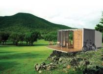 The All Terrain Cabin (ATC) By BARK.  Small scaled prefab shipping container green home architecture design.